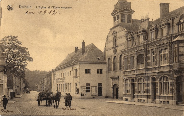 Rue Guillaume Maisiers et  l'église en 1912